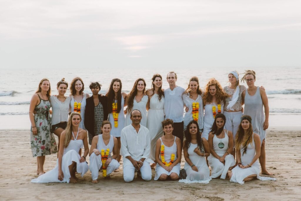 Parimukti somatic therapy training group on the beach