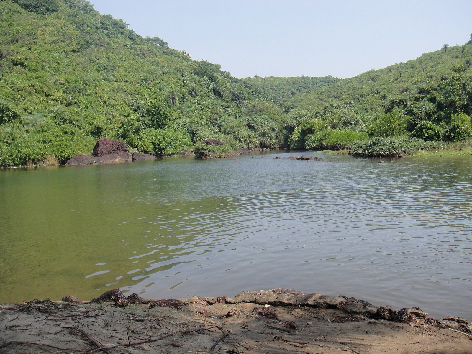 Sweet Water Lake near Arambol with green hills behind it